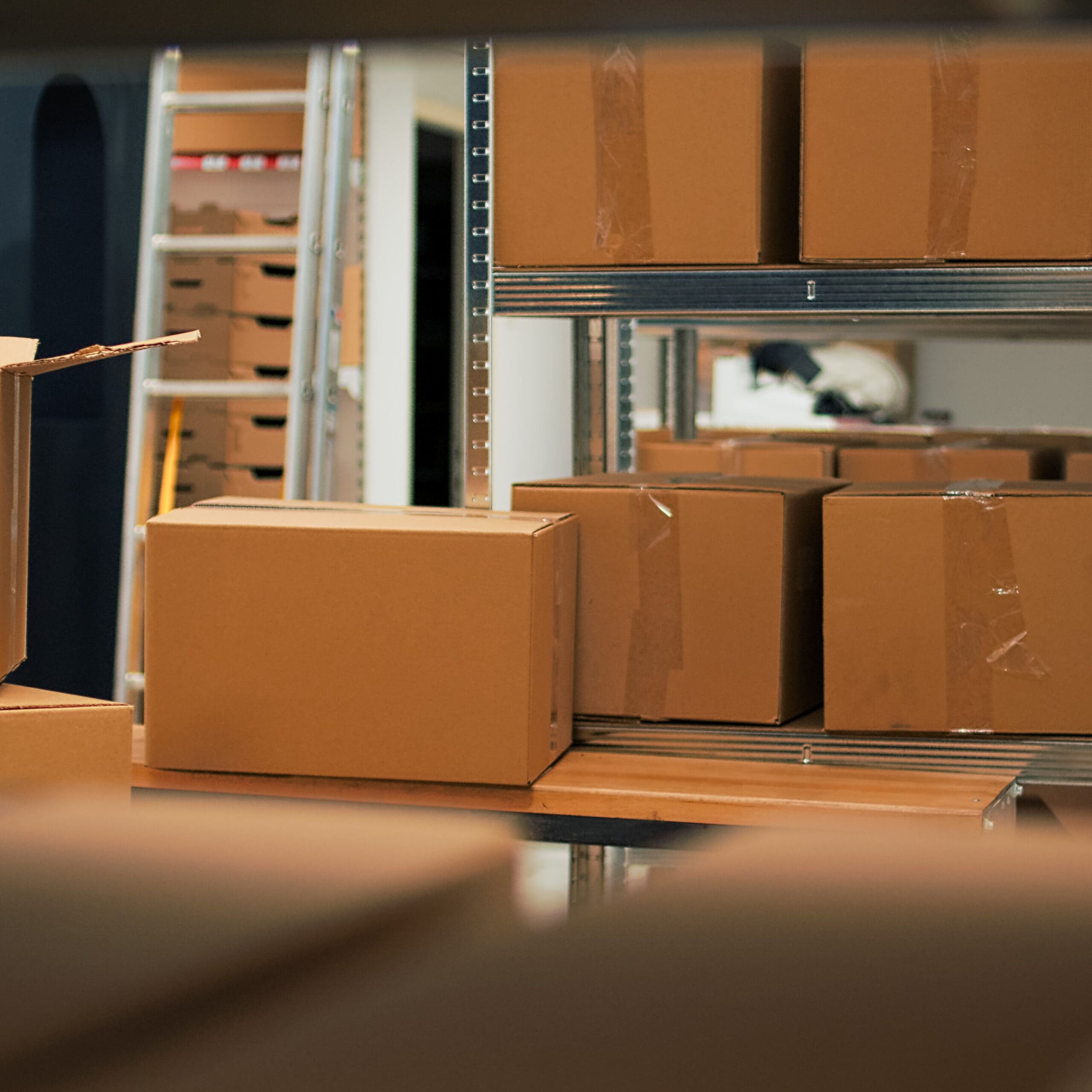 Empty storage space filled with stacks of merchandise and goods