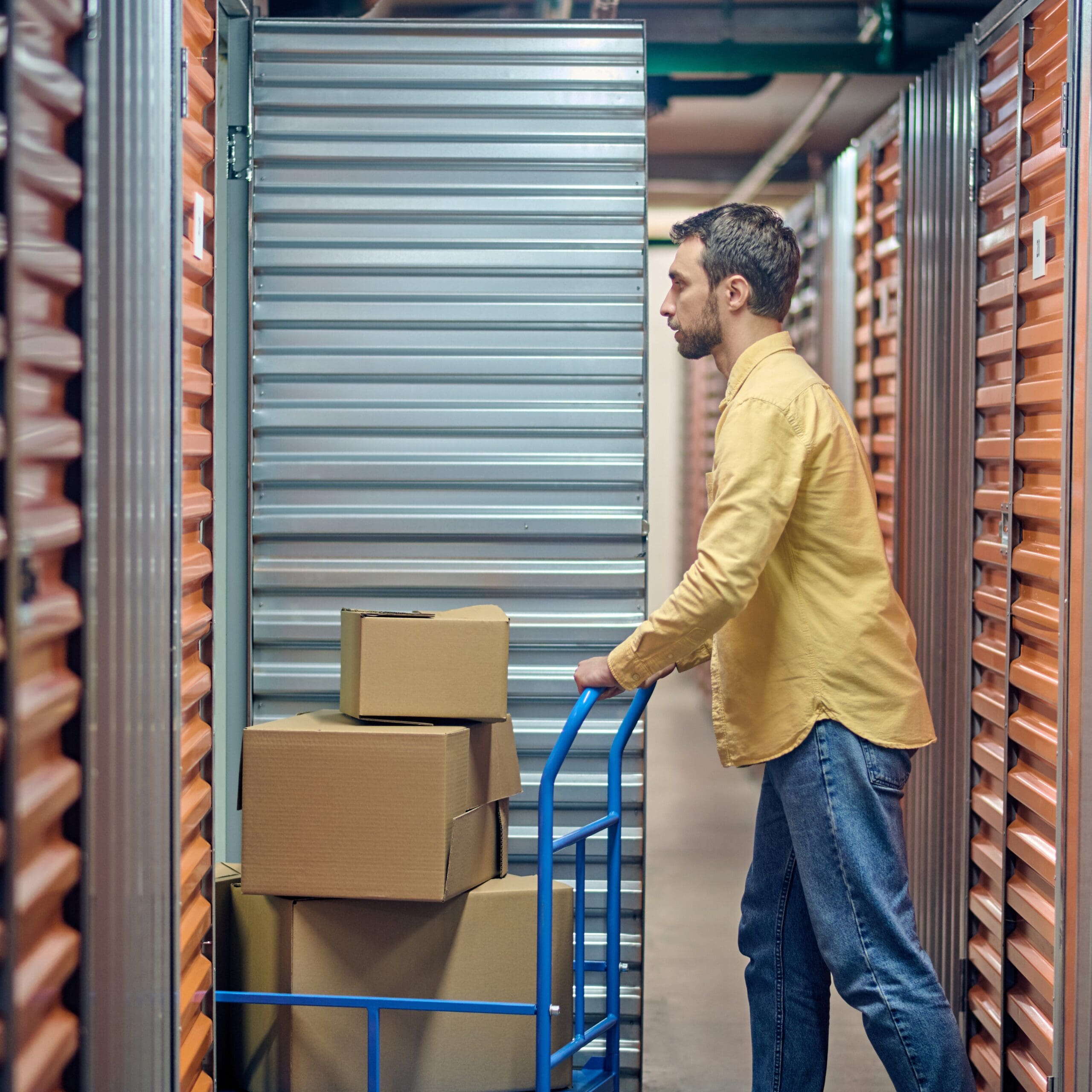 square_male-worker-entering-open-shipping-container